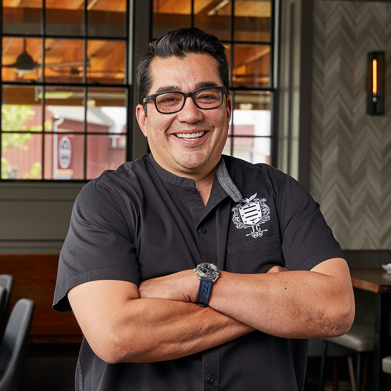 Chef Jose Garces pictured at table